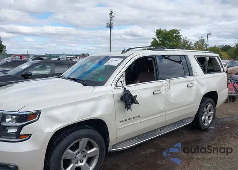 2015 Chevrolet Suburban 1500 Ltz z USA, uszkodzony, nr VIN 1GNSKKKC3FR144854